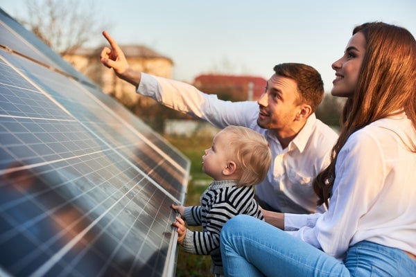 Couple looking at solar panels 