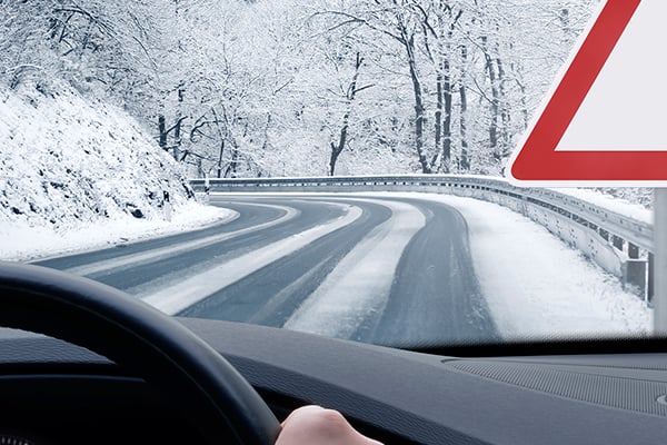 Car driving on icy roads