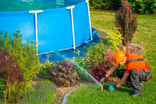 man and sprinkler