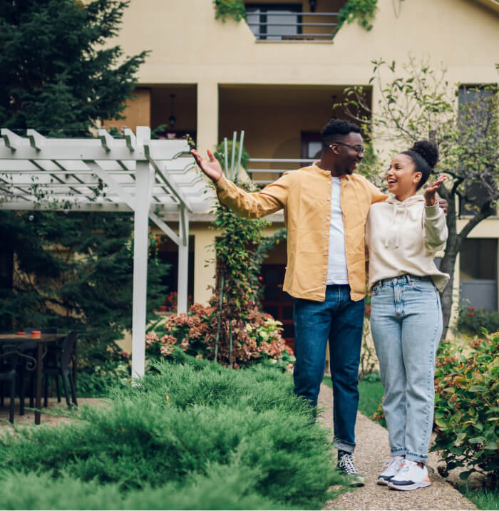 Couple outside home