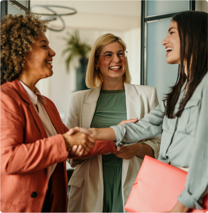 Agent shaking hand with client