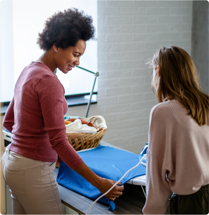 Woman at ironing board