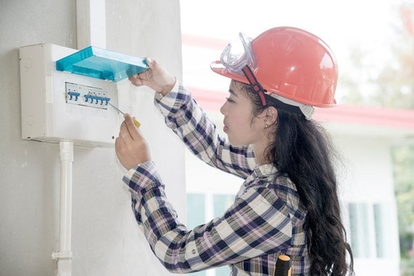 inspecting breaker box