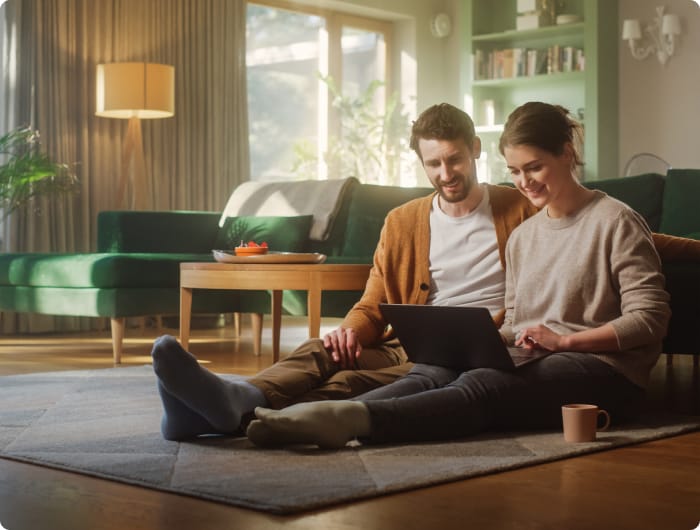 Couple looking at laptop