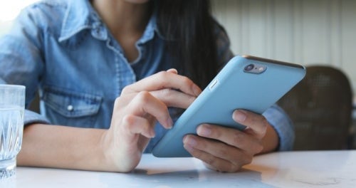 woman using smartphone