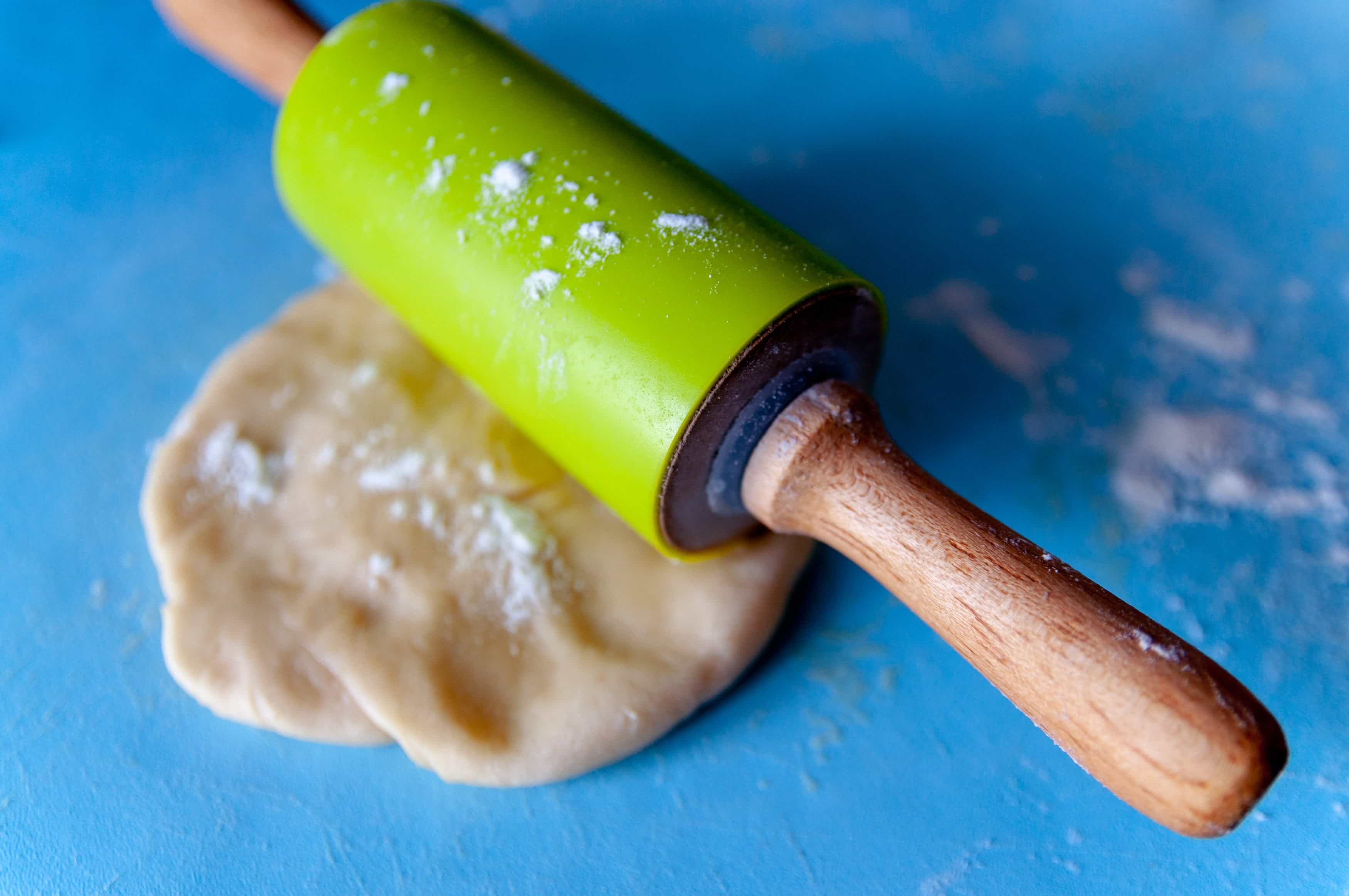 small green rolling pin